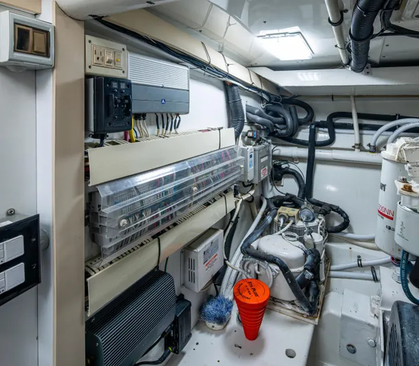  Yacht Photos Pics Engine room of 2005 Gamefisherman 45 Express, showcasing electrical systems and equipment.