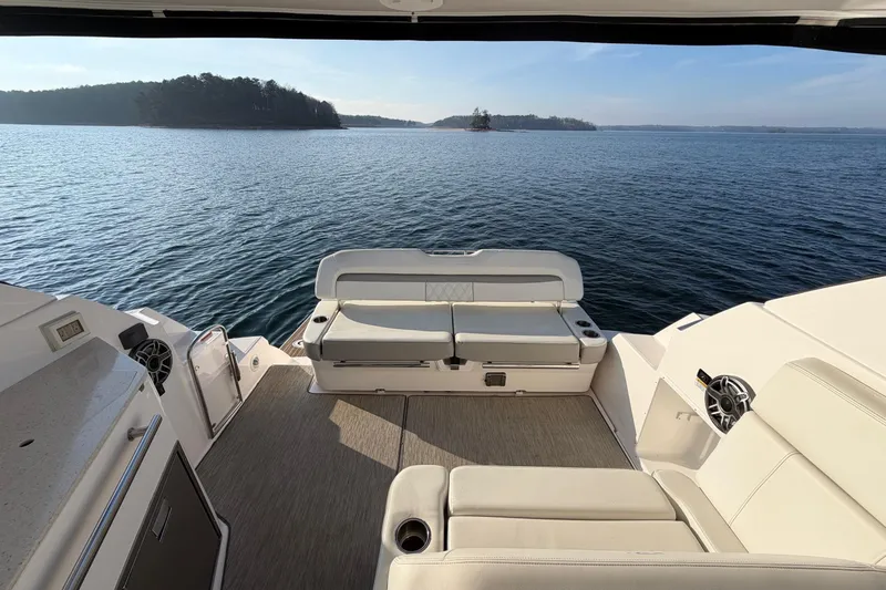  Yacht Photos Pics 2019 Regal 35 Sport Coupe boat interior with scenic lake view.