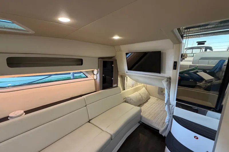  Yacht Photos Pics Interior of 2019 Regal 35 Sport Coupe with modern seating and TV.