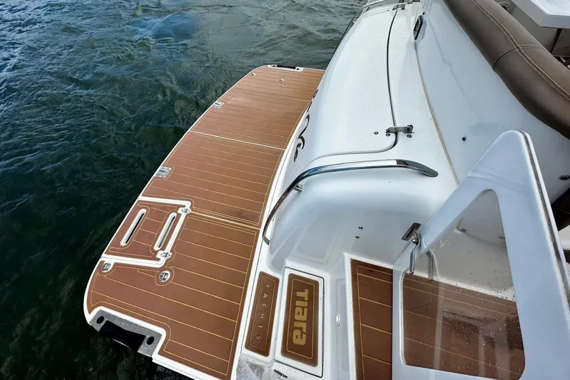  Yacht Photos Pics 2003 Tiara Yachts 4000 Express swim platform with teak decking.