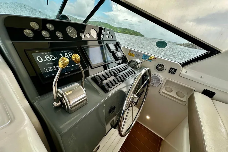  Yacht Photos Pics Cockpit of 2003 Tiara Yachts 4000 Express with navigation controls and scenic view.