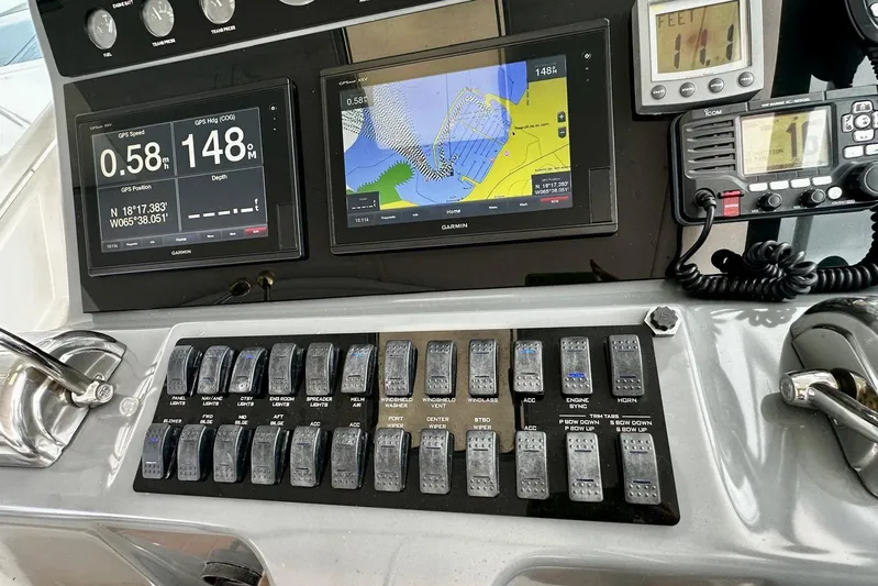  Yacht Photos Pics Control panel of a 2003 Tiara Yachts 4000 Express with navigation and communication systems.