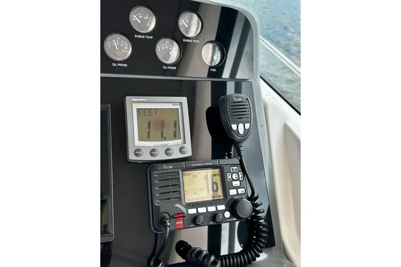 Yacht Photos Pics Control panel of a 2003 Tiara Yachts 4000 Express with depth and communication instruments.