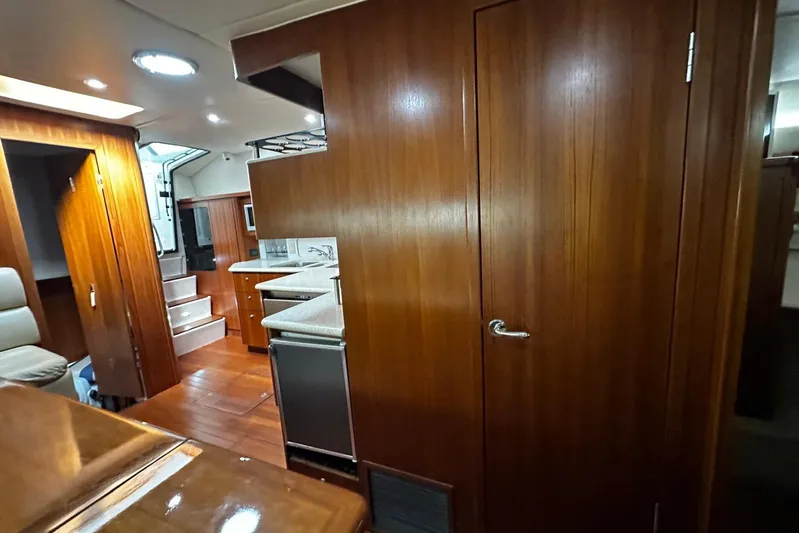  Yacht Photos Pics Interior of 2003 Tiara Yachts 4000 Express, featuring wood paneling and modern amenities.