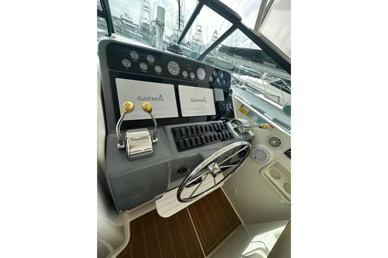  Yacht Photos Pics Helm of 2003 Tiara Yachts 4000 Express with Garmin navigation system and controls.