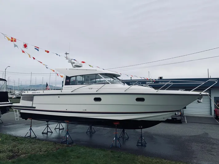 Ya Bawwt It Yacht Photos Pics 2017 Nimbus 34 Nova boat on stands, decorated with flags.