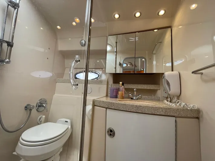 Samari Yacht Photos Pics Luxurious bathroom in 2007 Regal 3760 Sportyacht with modern fixtures and elegant design.