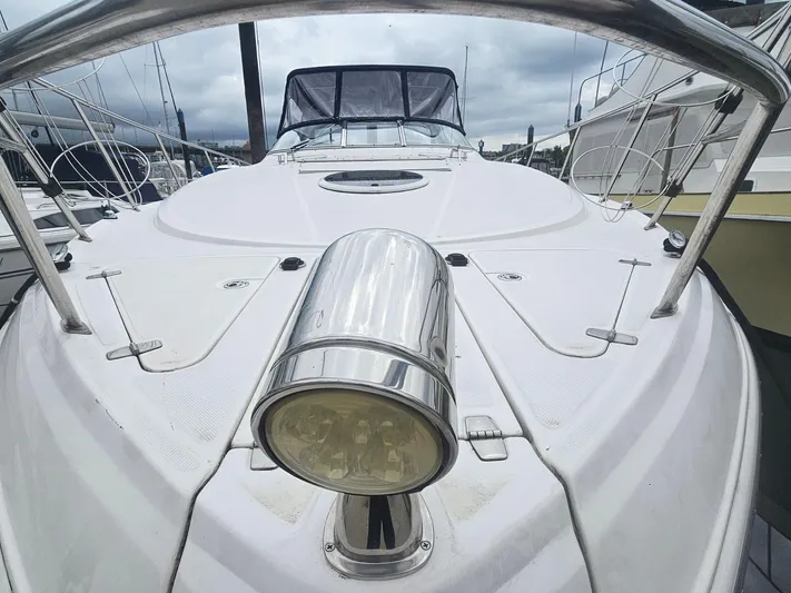 Samari Yacht Photos Pics 2007 Regal 3760 Sportyacht deck with stainless steel spotlight and railing.