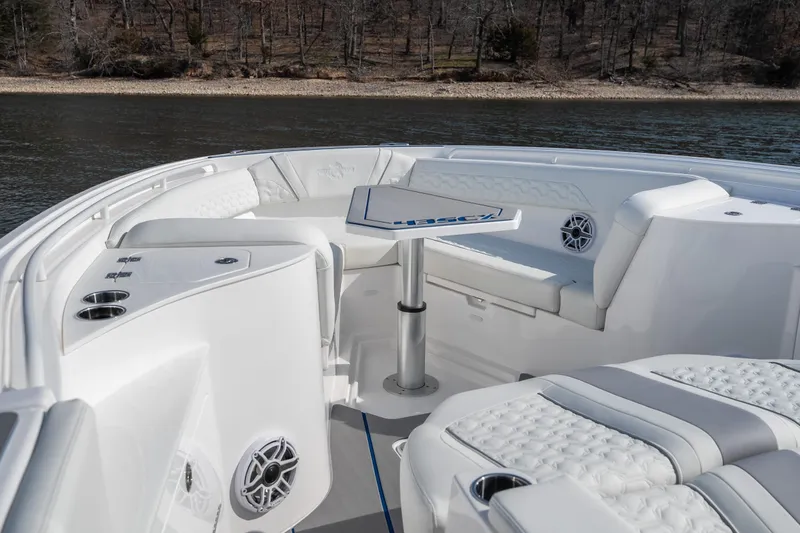  Yacht Photos Pics Luxurious seating area on 2026 Fountain 43 SCX boat, featuring elegant white upholstery.