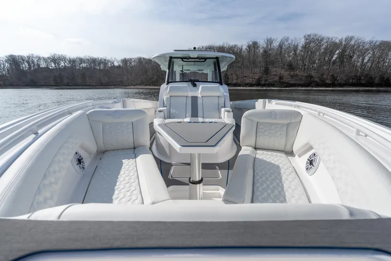  Yacht Photos Pics Luxurious 2026 Fountain 43 SCX boat interior with plush seating and sleek design.