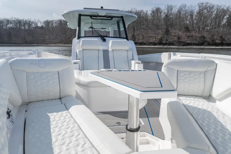 Yacht Photos Pics Luxurious 2026 Fountain 43 SCX boat interior with plush seating and sleek design.