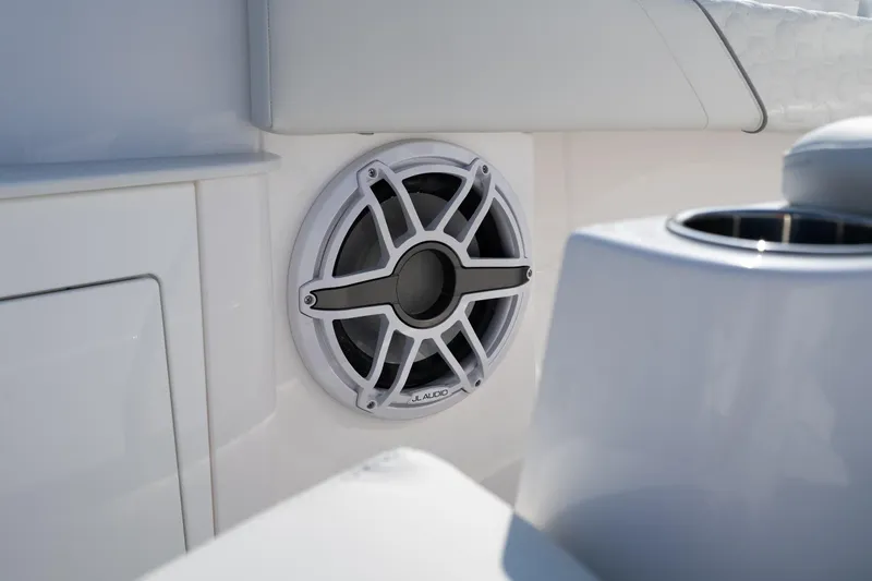  Yacht Photos Pics Speaker on 2026 Fountain 43 SCX boat, featuring sleek white interior design.