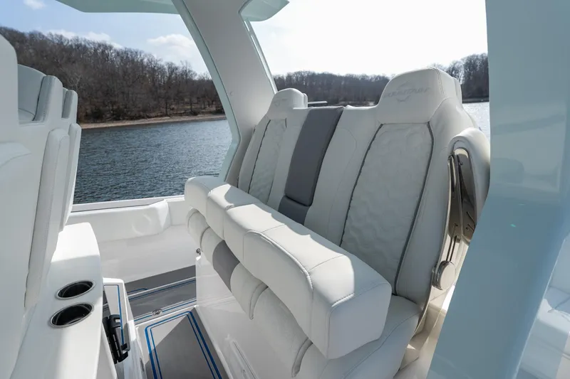  Yacht Photos Pics Luxurious interior seating of 2026 Fountain 43 SCX boat with lake view.