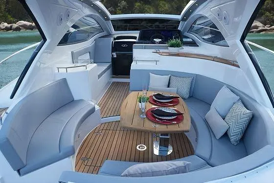  Yacht Photos Pics Luxurious 2026 Schaefer 400 yacht interior with elegant seating and dining area.