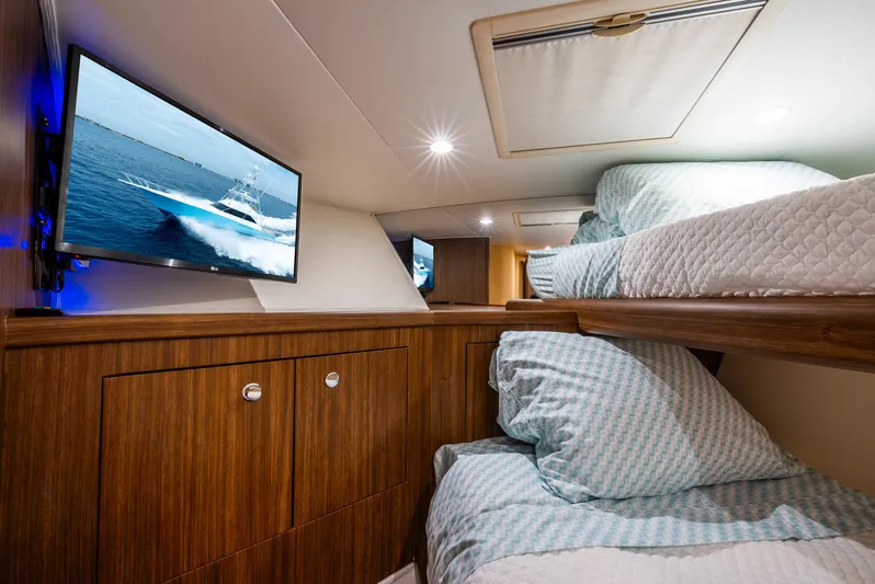 Knotty Girl Yacht Photos Pics 2005 Viking 52 Convertible yacht cabin with bunk beds and TV.