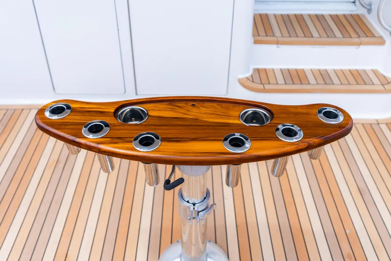 Knotty Girl Yacht Photos Pics Teak fighting chair on 2005 Viking 52 Convertible yacht.