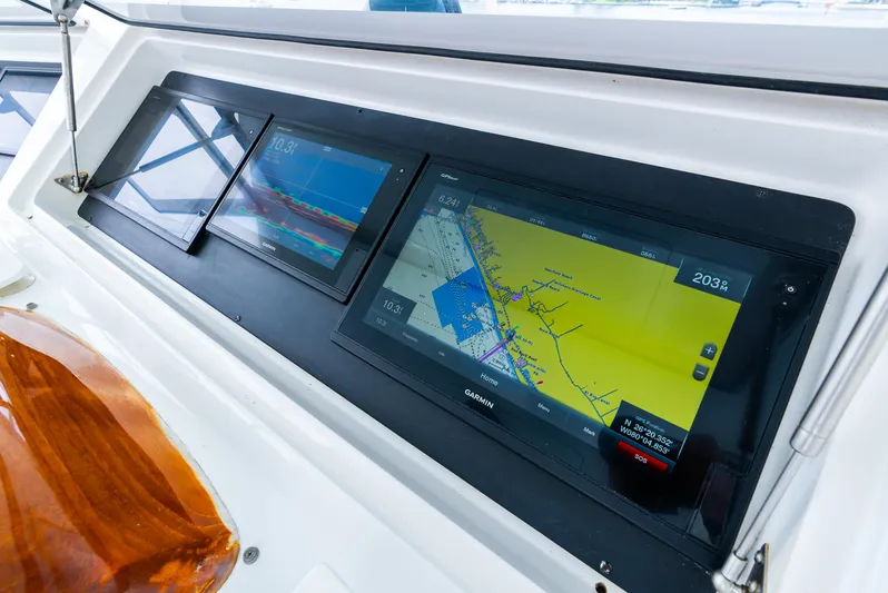 Knotty Girl Yacht Photos Pics Navigation system on a 2005 Viking 52 Convertible yacht.