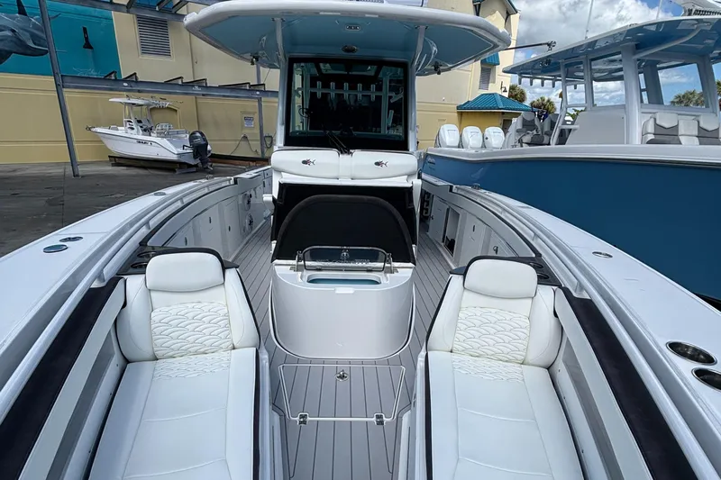  Yacht Photos Pics 2024 Crevalle 33 CSF boat interior with white seating and modern design.