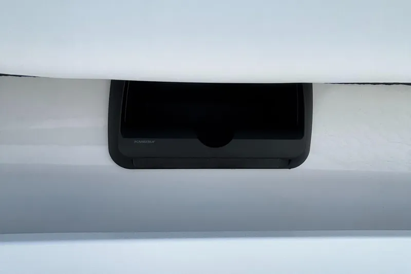  Yacht Photos Pics 2024 Crevalle 33 CSF boat detail, featuring a sleek black component on a white surface.