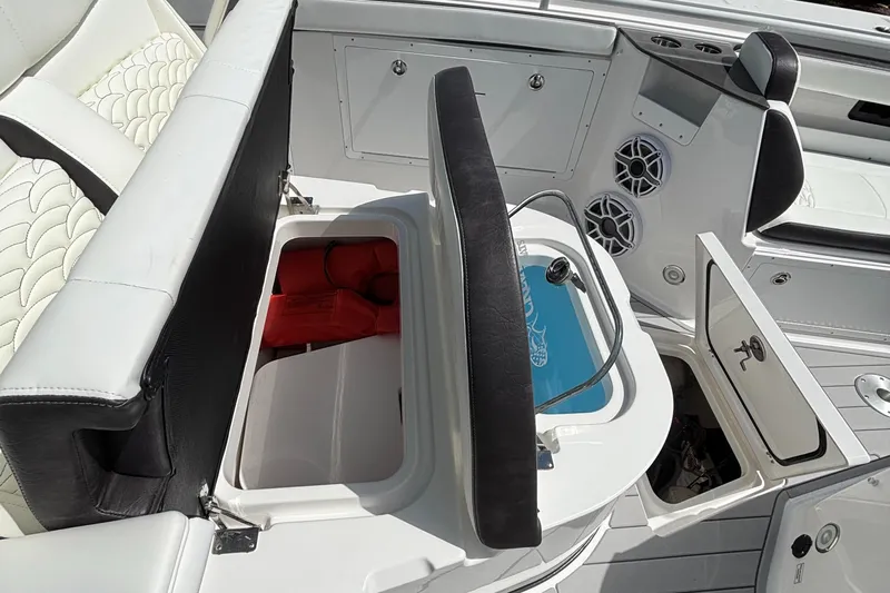 Yacht Photos Pics 2024 Crevalle 33 CSF boat interior with seating, storage, and speakers.