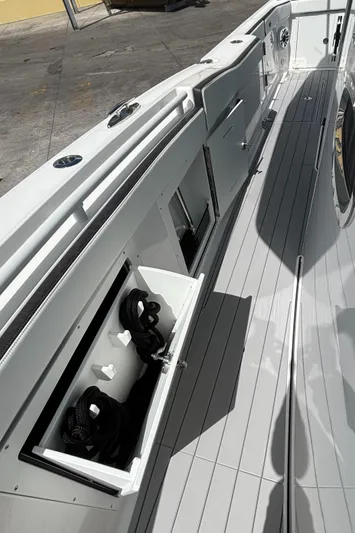  Yacht Photos Pics 2024 Crevalle 33 CSF boat deck with storage compartments open.