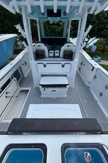  Yacht Photos Pics 2024 Crevalle 33 CSF boat interior with seating and storage, featuring modern design elements.