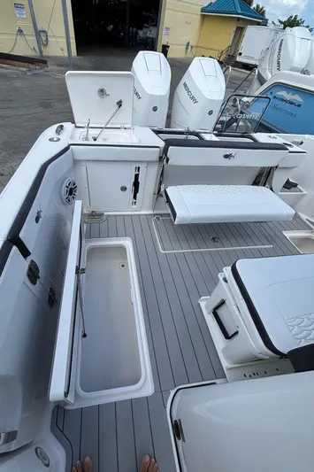  Yacht Photos Pics 2024 Crevalle 33 CSF boat deck with storage compartments and seating.