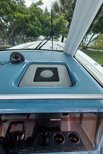  Yacht Photos Pics 2024 Crevalle 33 CSF boat dashboard with navigation equipment and windshield view.
