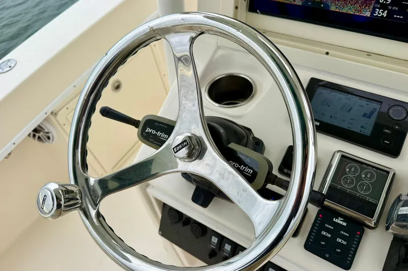  Yacht Photos Pics Steering wheel and controls of 2019 Young Boats 27 model.