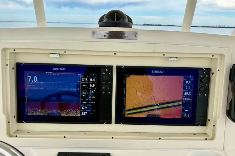  Yacht Photos Pics Simrad navigation displays on 2019 Young Boats 27, showing sonar and chart data.