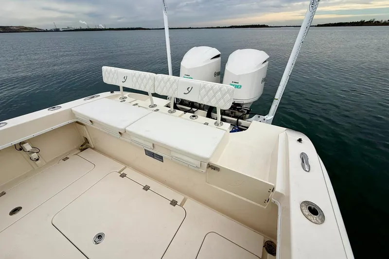  Yacht Photos Pics 2019 Young Boats 27 with dual Yamaha engines on calm water.