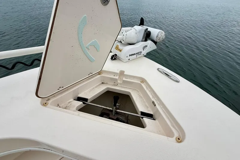  Yacht Photos Pics 2019 Young Boats 27 with Minn Kota trolling motor on open water.