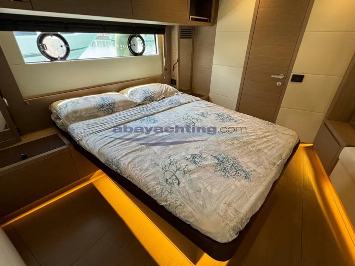  Yacht Photos Pics Luxurious bedroom interior of 2022 Pardo Yachts GT52 with elegant lighting and modern design.