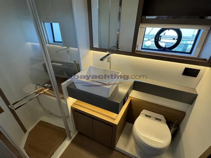  Yacht Photos Pics Modern bathroom in 2022 Pardo Yachts GT52, featuring sleek fixtures and elegant design.