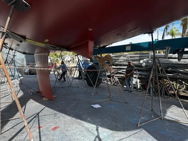 2.0 Impulsive Yacht Photos Pics Beneteau 57 yacht under maintenance, supported by stands, 2005 model.