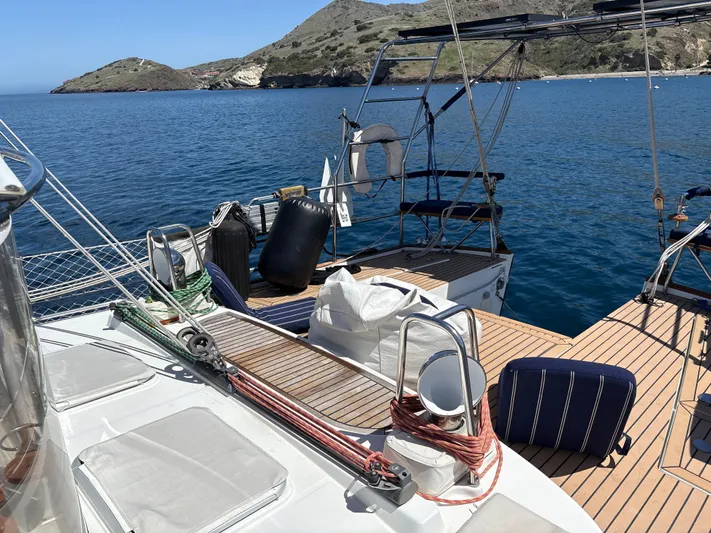 2.0 Impulsive Yacht Photos Pics Deck of a 2005 Beneteau 57 yacht with scenic ocean view.