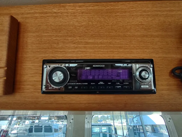 Santosha Yacht Photos Pics Kenwood stereo system on 2006 Nordic Tug 32 boat interior.