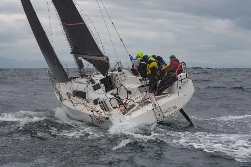 Rush Yacht Photos Pics 2018 Jeanneau Sun Fast 3600 sailing in rough seas with crew onboard.