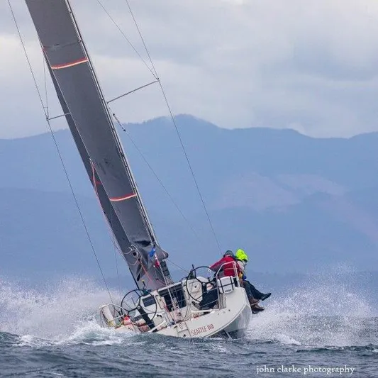 Rush Yacht Photos Pics 2018 Jeanneau Sun Fast 3600 sailing in rough waters with crew onboard.
