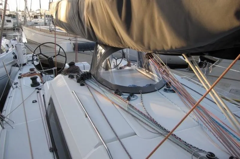 Rush Yacht Photos Pics 2018 Jeanneau Sun Fast 3600 sailboat deck with rigging and steering wheel.