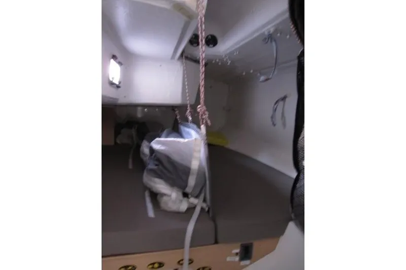 Rush Yacht Photos Pics Interior cabin of 2018 Jeanneau Sun Fast 3600 sailboat, featuring compact sleeping area.