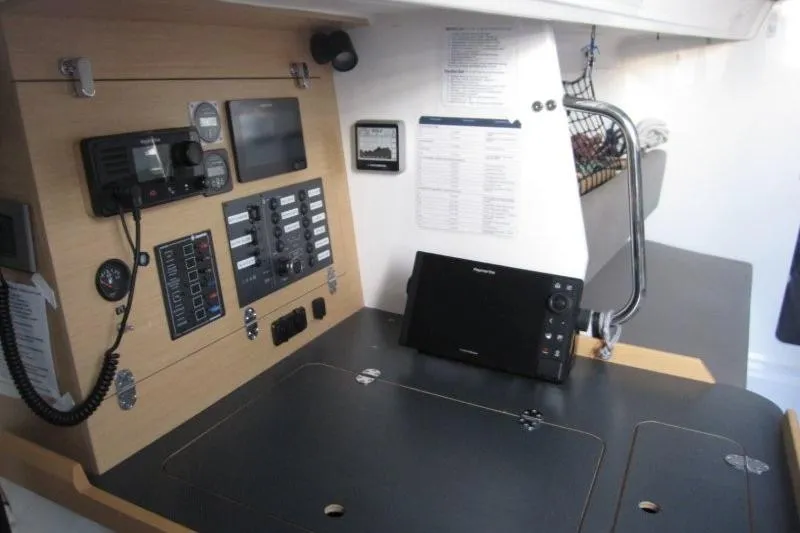 Rush Yacht Photos Pics 2018 Jeanneau Sun Fast 3600 navigation station with control panels and equipment.