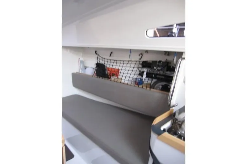 Rush Yacht Photos Pics 2018 Jeanneau Sun Fast 3600 interior with storage net and seating area.