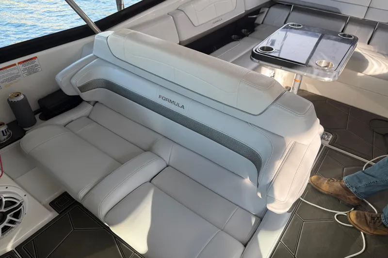  Yacht Photos Pics 2021 Formula 350 Crossover Bowrider I/O interior with luxurious seating and table setup.