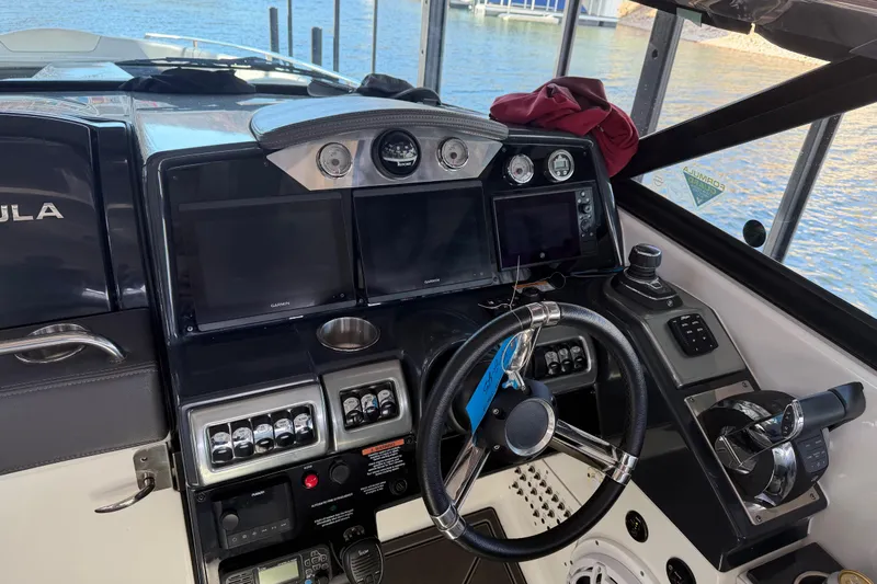  Yacht Photos Pics Cockpit of 2021 Formula 350 Crossover Bowrider I/O with advanced navigation controls.