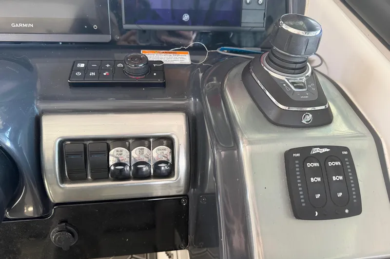  Yacht Photos Pics Control panel of 2021 Formula 350 Crossover Bowrider I/O with joystick and switches.