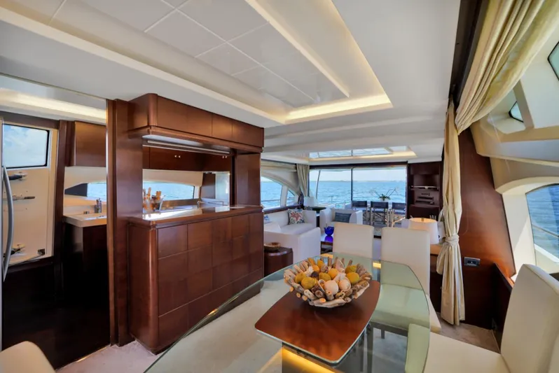  Yacht Photos Pics Luxurious interior of 2009 Azimut 75 yacht with elegant dining area and sea view.