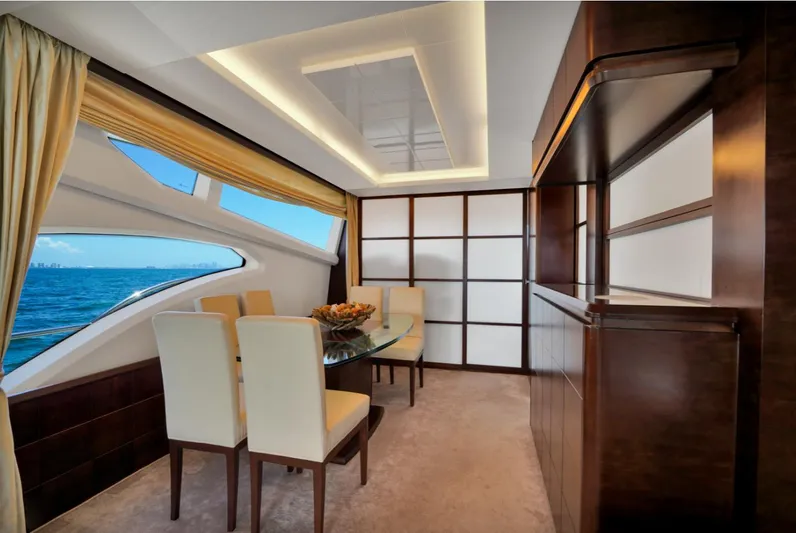  Yacht Photos Pics Luxurious interior of 2009 Azimut 75 yacht with elegant dining area and ocean view.