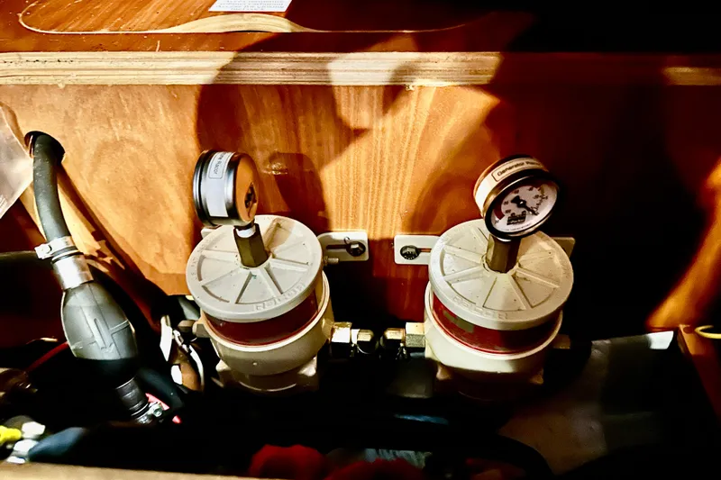  Yacht Photos Pics Fuel filters and gauges inside a 2004 Beneteau 50 yacht engine compartment.
