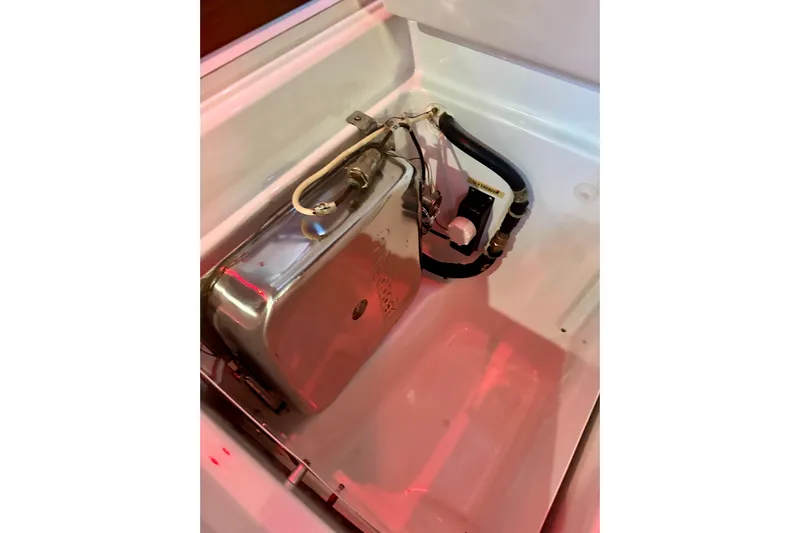  Yacht Photos Pics Engine compartment of a 2004 Beneteau 50 yacht, showcasing mechanical components.